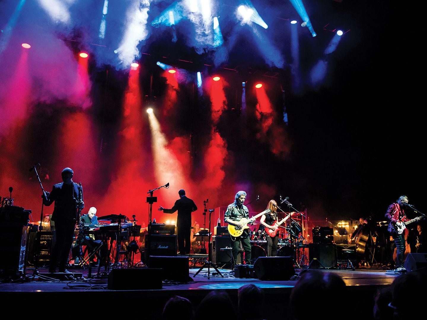 A live band on a small dark stage